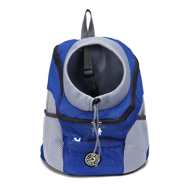 Cat looking out of a black breathable pet carrier backpack
