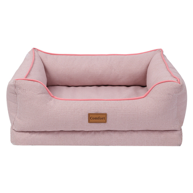 Small dog resting in a green breathable linen bed