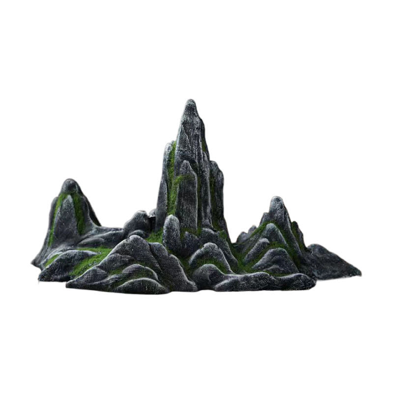 Fish swimming past a snow mountain rock decoration