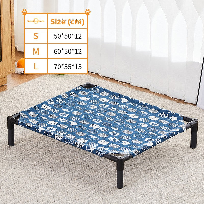 Small dog resting on an elevated bed with cyan alpaca pattern