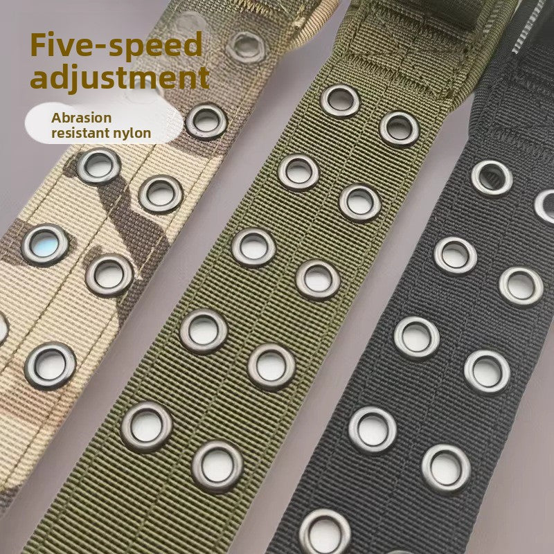 Tactical nylon dog collar with metal buckle in outdoor colours, shown in use