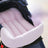 Pink pet stroller cushion with detachable mesh fence