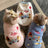 Small dog wearing a pink thick fleece cartoon vest