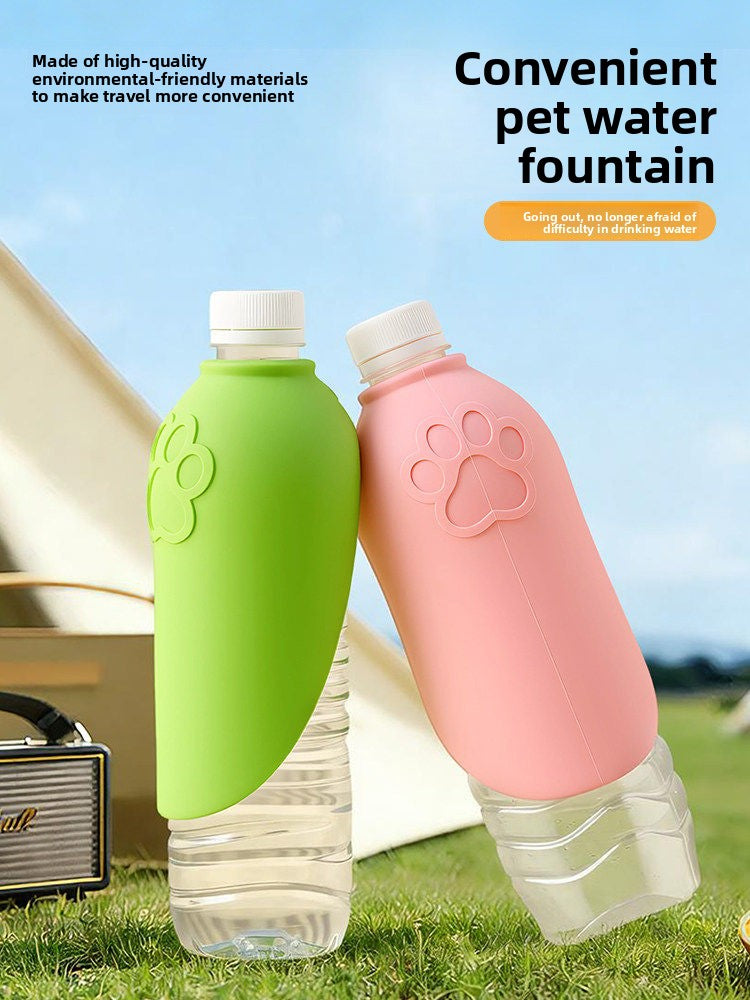 Silicone dog water bottle with foldable U-shaped lid in Green 2-Pack, in a home setting