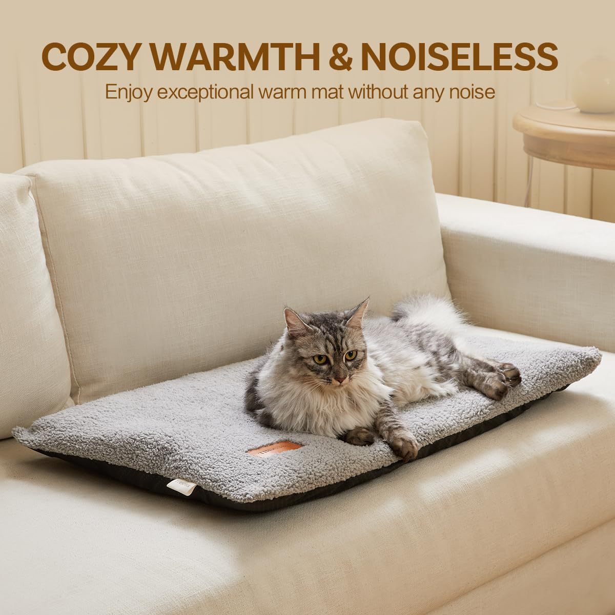 Dog resting on a white thick pet bed mat outdoors