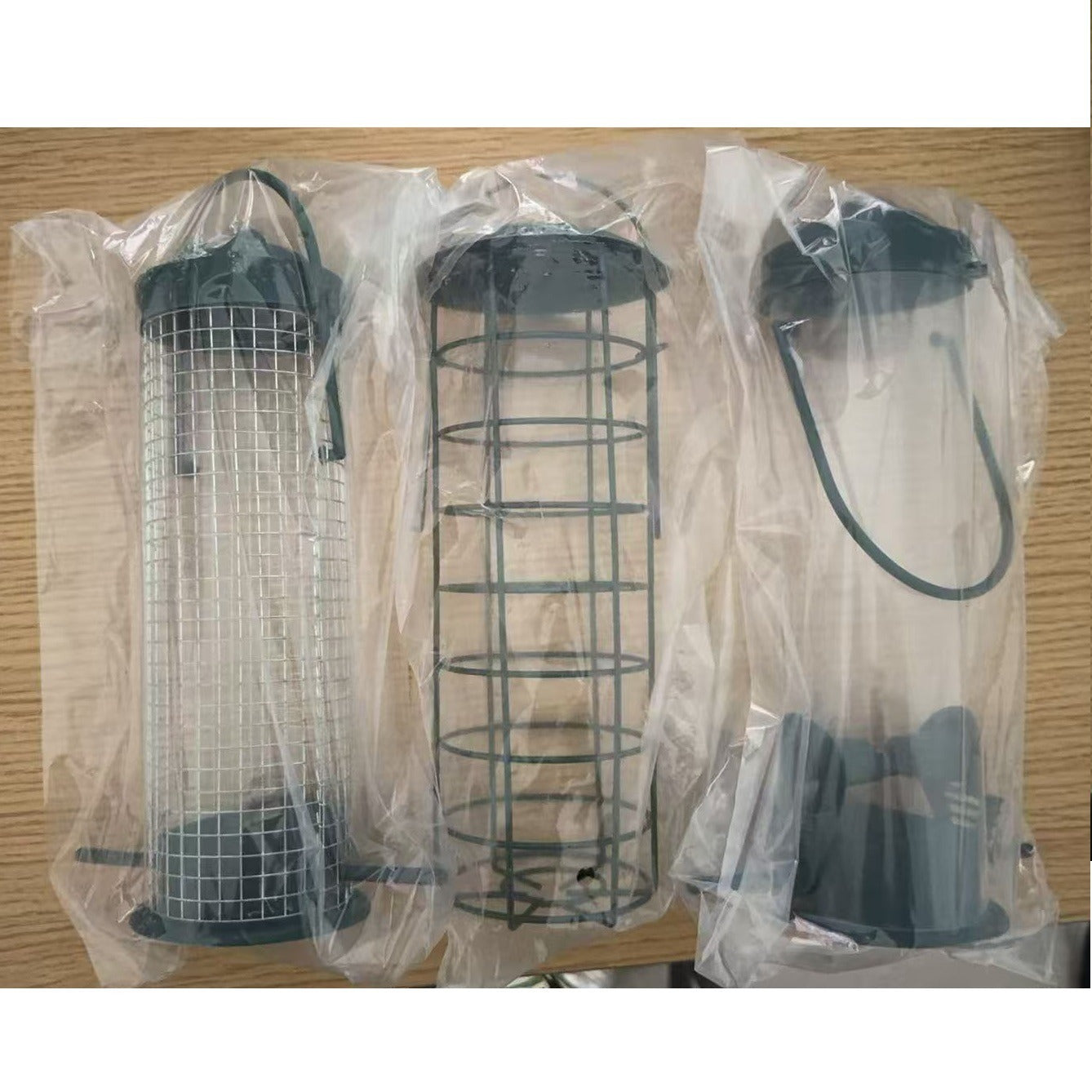 Mixed set of three black wire mesh bird feeders