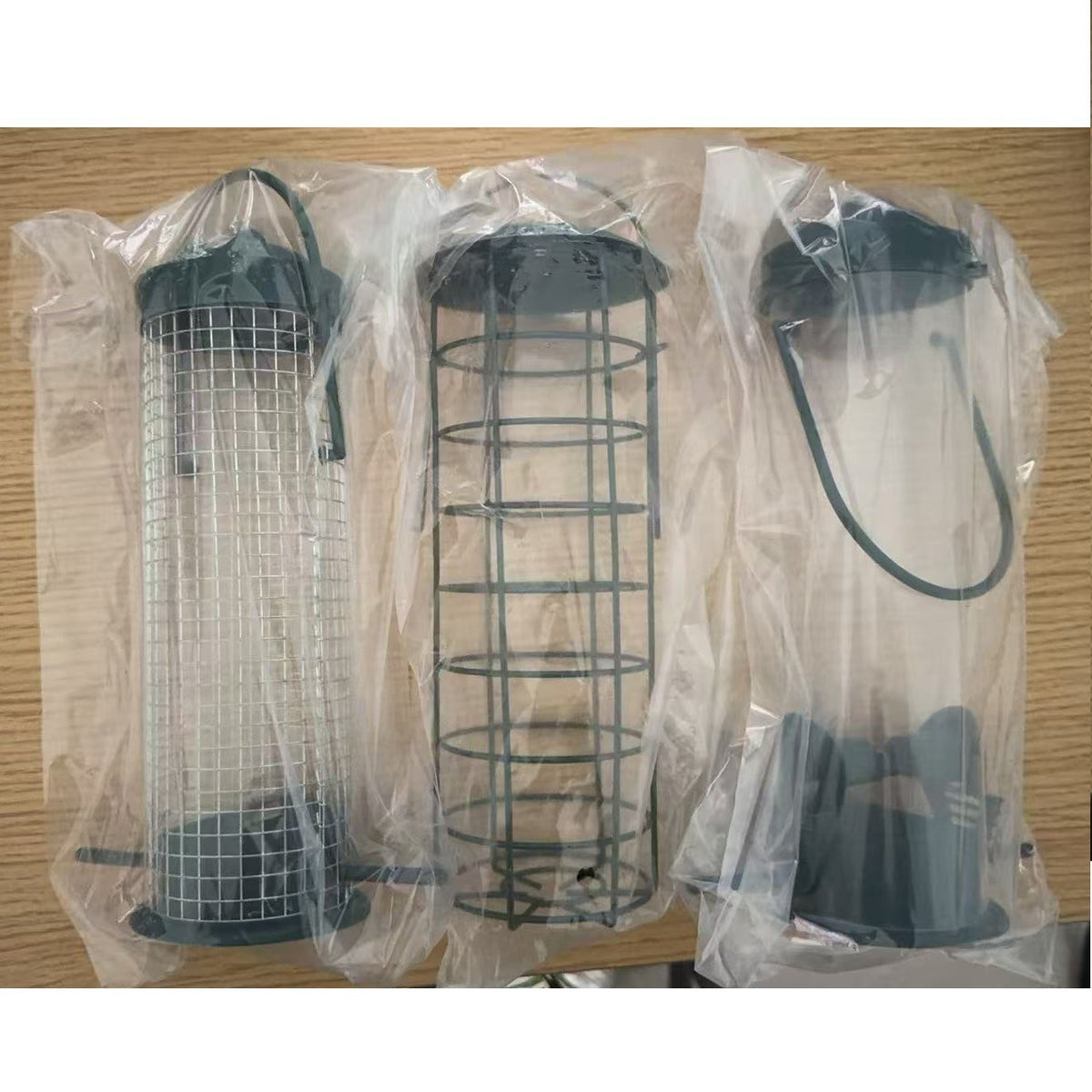 Mixed set of three black wire mesh bird feeders