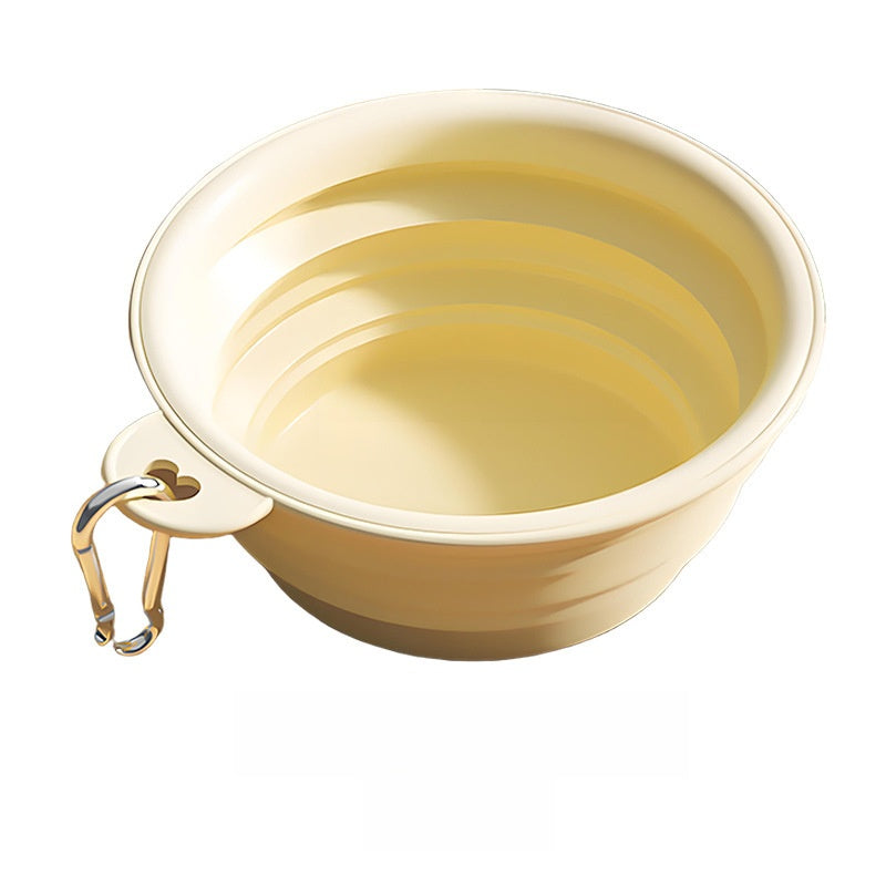 Collapsible pet travel bowl with clip in Macaron Purple, in use with a pet