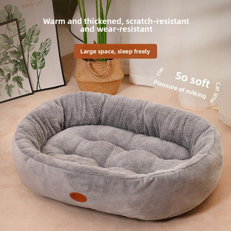 Thick oval pet bed in warm cloth, photo 1 of 17