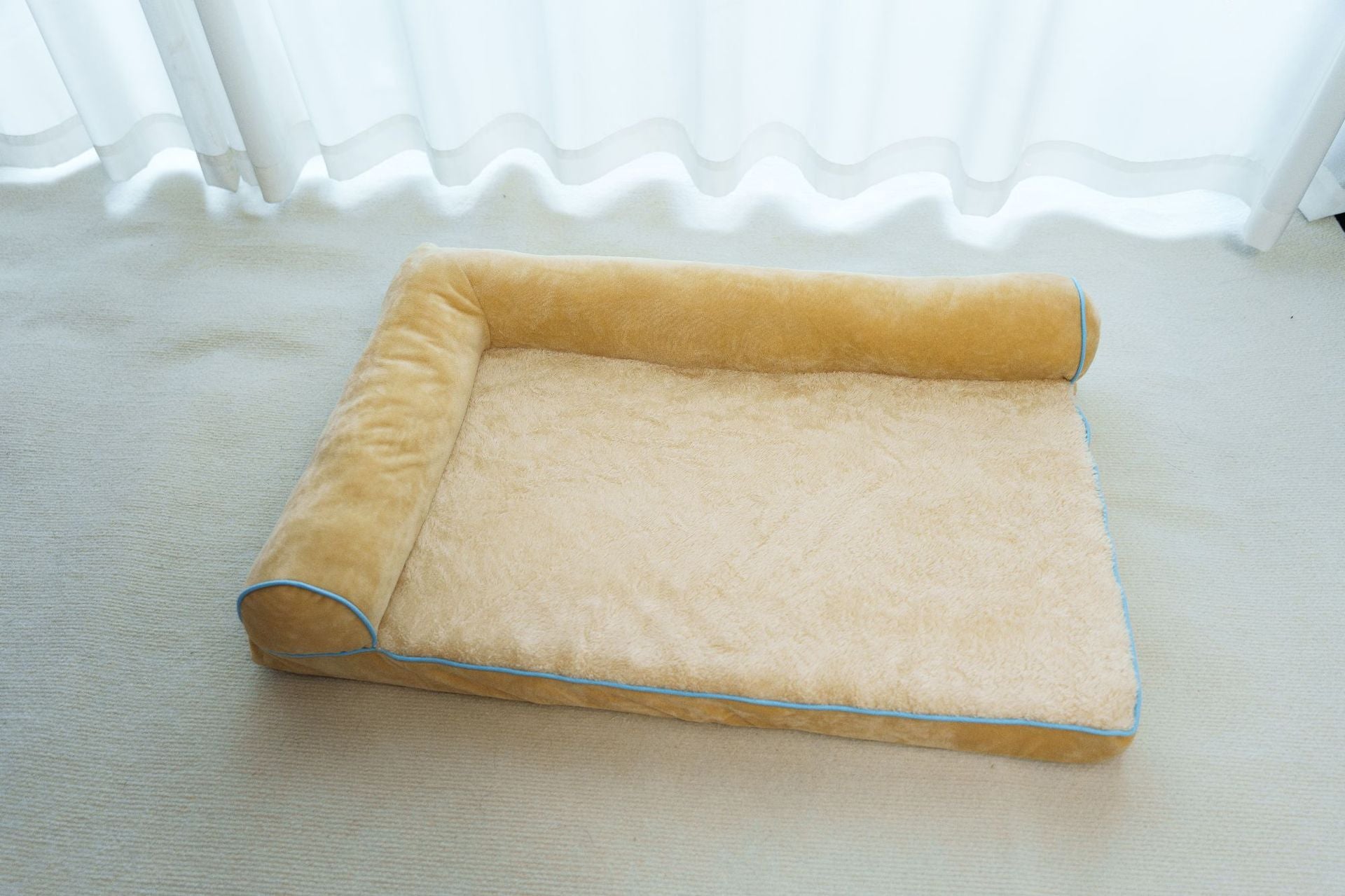 Blue plush cat bed in medium size with soft cover