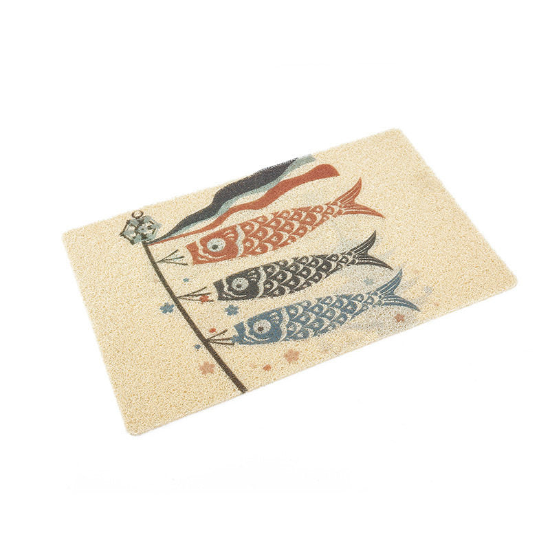 Textured cat litter mat in front of tray, close-up detail view
