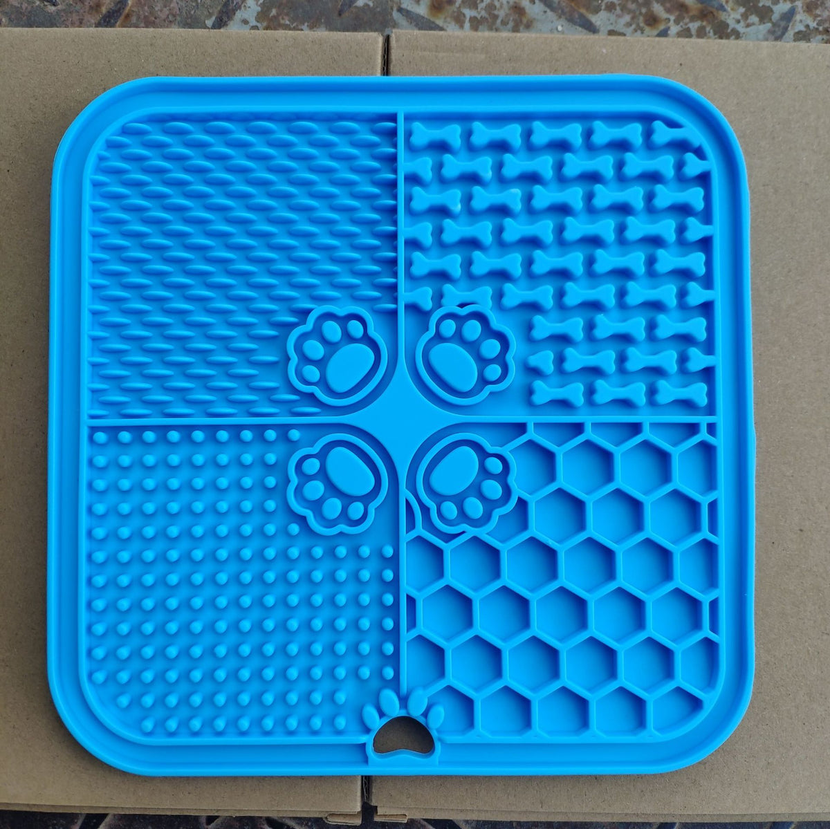 Silicone slow feeder lick mat for dogs in Royal Blue, detail and texture view