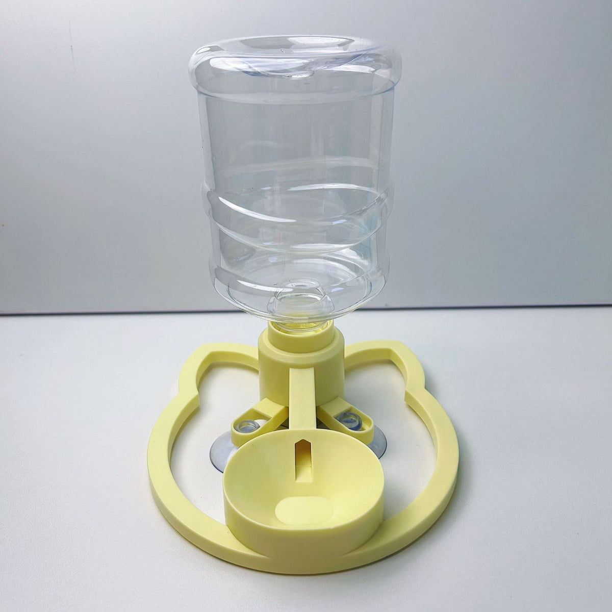 Gravity pet water dispenser bowl with anti-tip base in Floor Standing with Bottle, Yellow