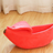 Playful fruit-shaped pet bed with curved sides, product overview photo