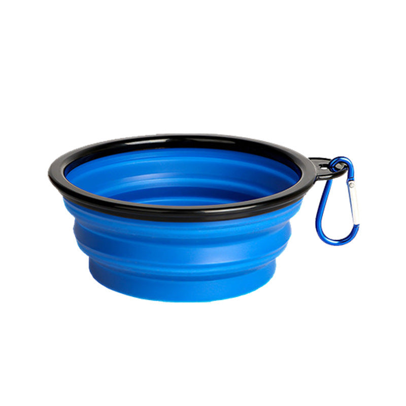 Collapsible pet travel bowl with clip in Green, in a home setting