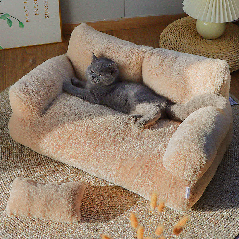 Cat resting on a sakura pink washable sofa bed