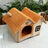 Grey enclosed pet house with double gable roof, view 1