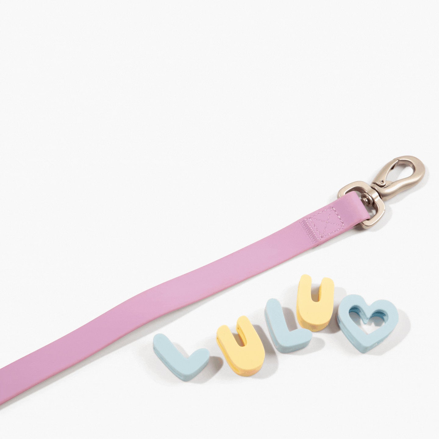 Silicone letter slides for pet collars, available from Pet Royale UK