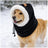 Black pet winter hat with long ear flaps and elastic strap