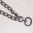 Detachable metal chain dog collar, in a home setting