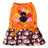 Coral fleece four-leg dog jumpsuit with holiday print, in use with a pet