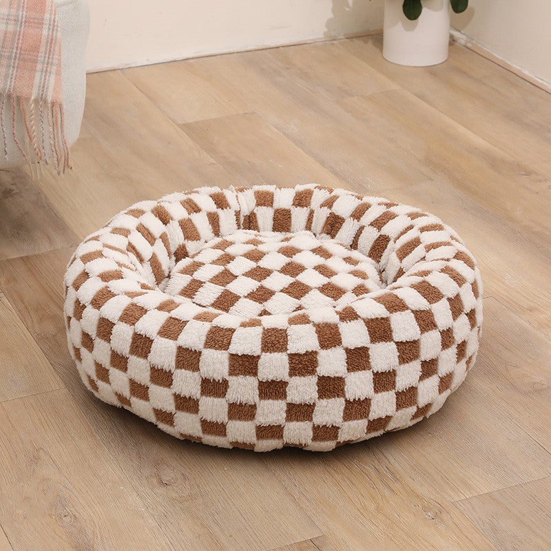 Plush round pet bed in check and floral prints, photo from another angle