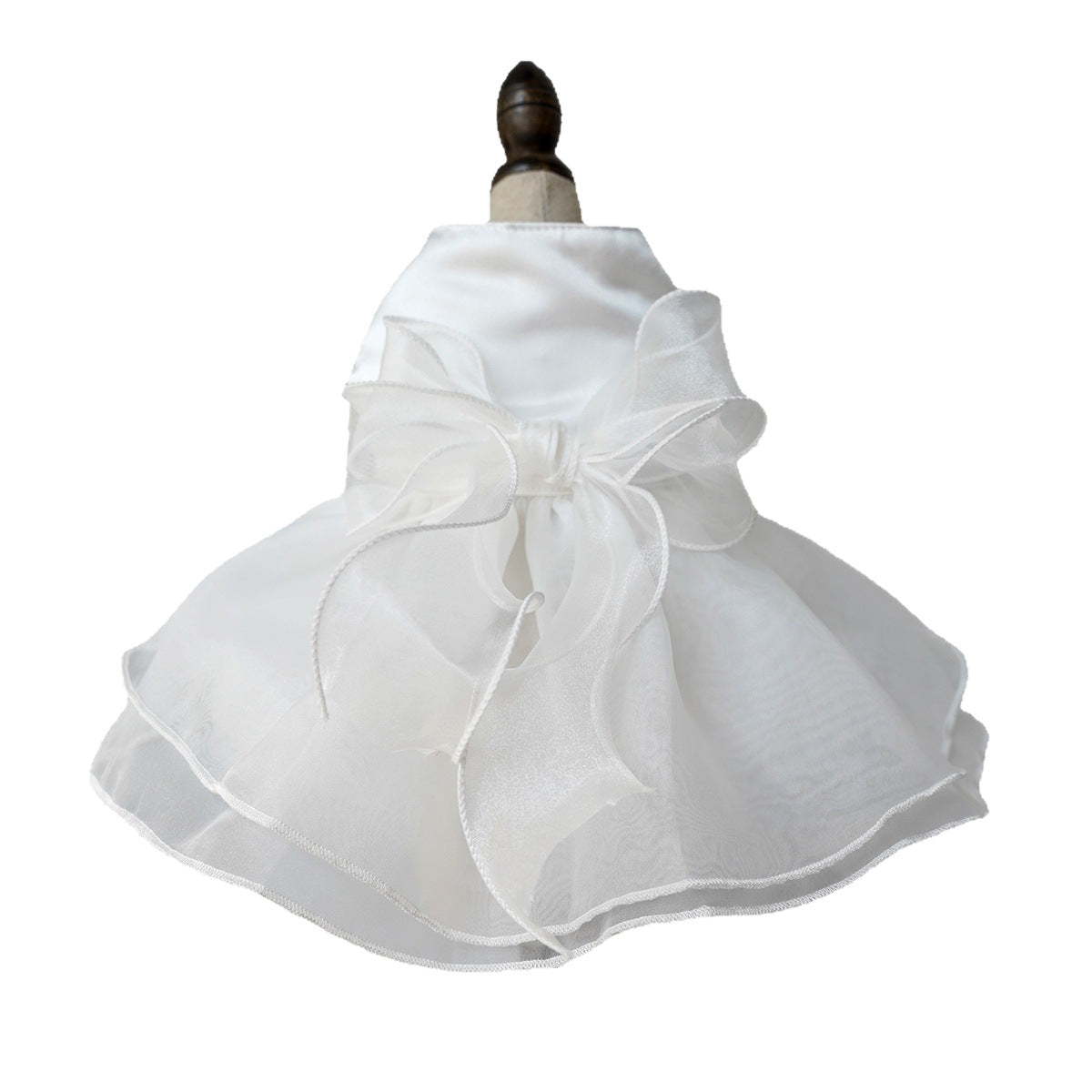 Small dog in a pink layered tutu princess dress