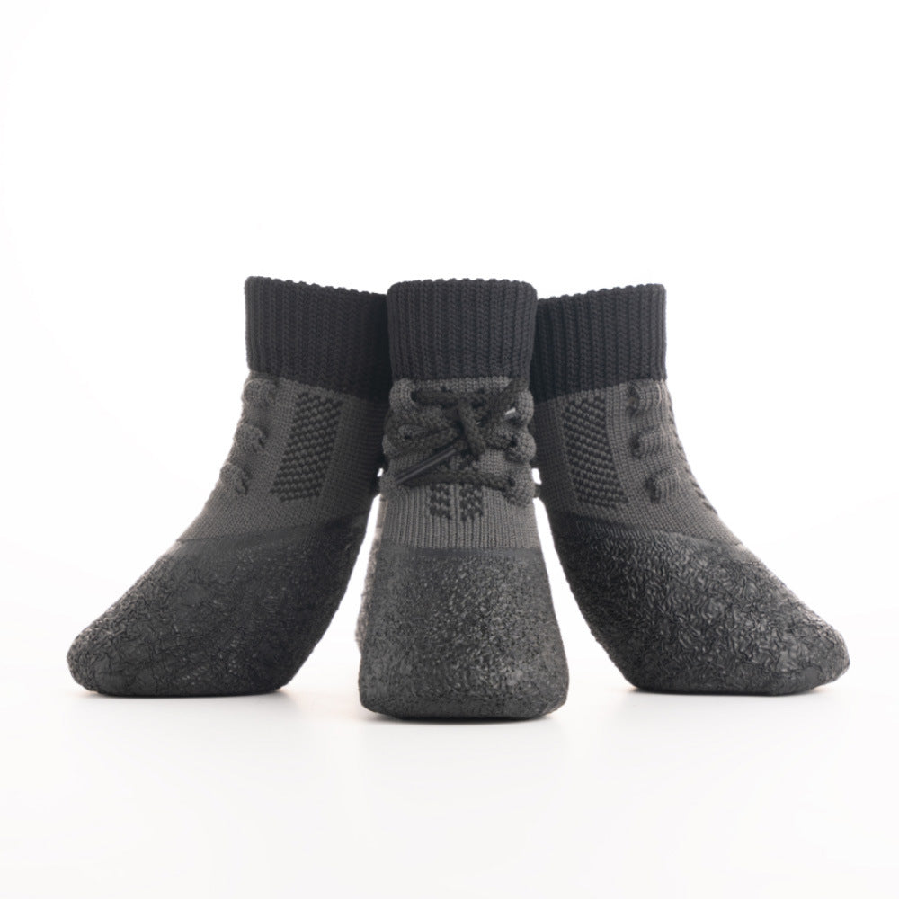 Sporty rubber dog protection shoes in Style 3, in use with a pet