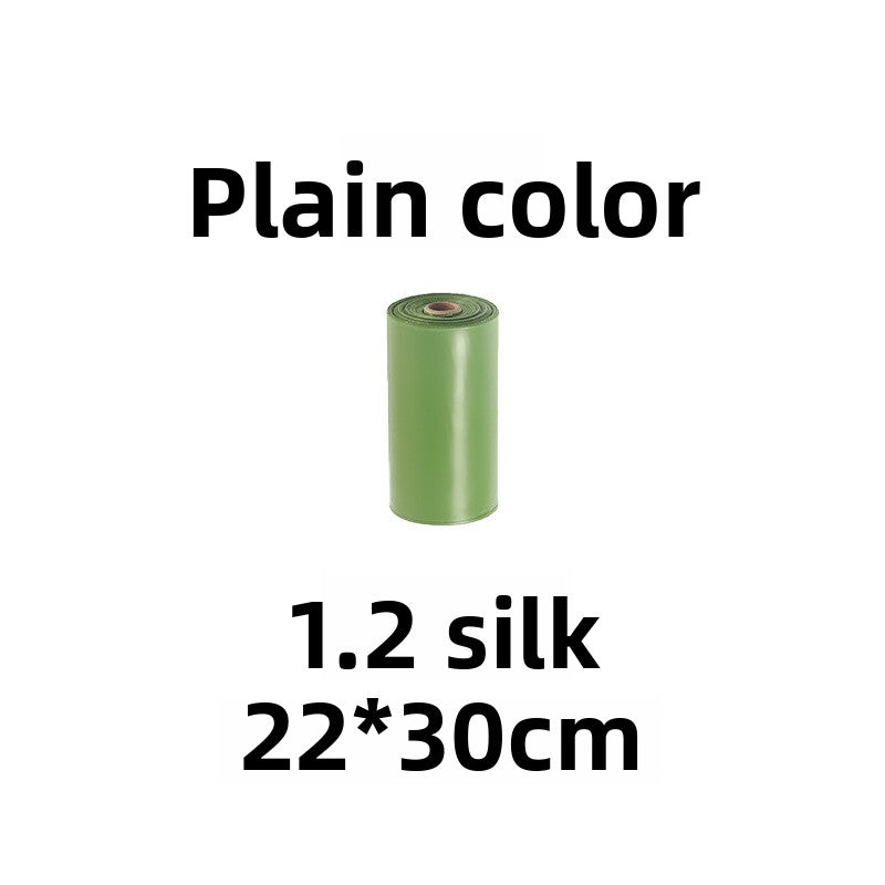 Biodegradable dog poop bags on rolls, detail and texture view