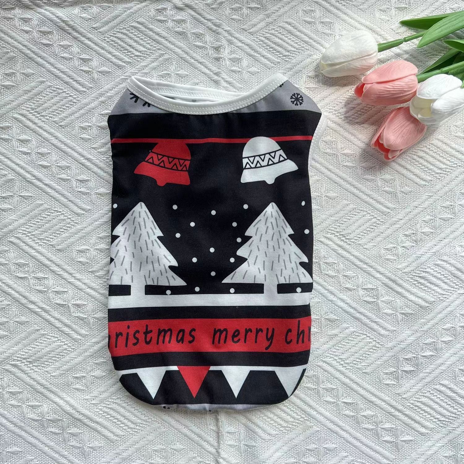 Lightweight Christmas dog vest in breathable polyester in Black White Tree, in a home setting