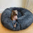 Brown round plush donut dog bed with raised rim, view 7