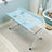 Folded stainless steel grooming station in grey for storage