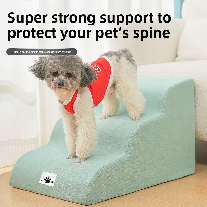 Small dog using non-slip foam steps to reach a sofa