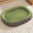 Green oval corduroy pet bed with non-slip base, photo 18