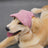 Dog baseball cap with ear openings in Corduroy Khaki, in a home setting