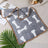 Small coral fleece pet mat in White Paw, detail and texture view