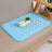 Machine washable ice silk pet cooling mat with blue trim