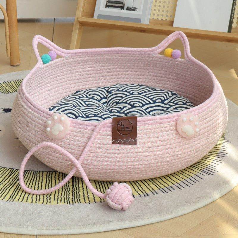 Handmade rattan cat bed with scratching board and ball
