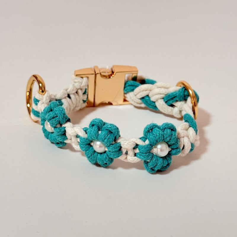 Handmade woven boho pet collar with pearl flowers in Light Green, in a home setting