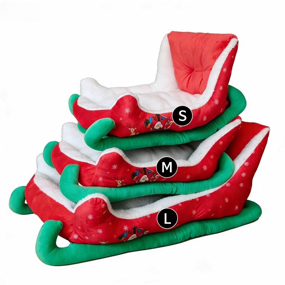 Sleigh-shaped Christmas plush dog bed with high sides in red
