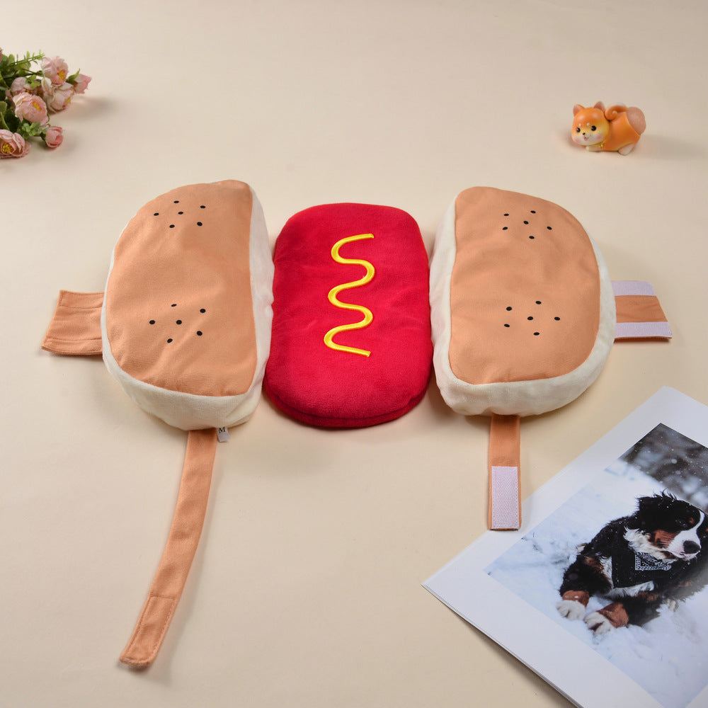 Small dog dressed in a funny frankfurter costume