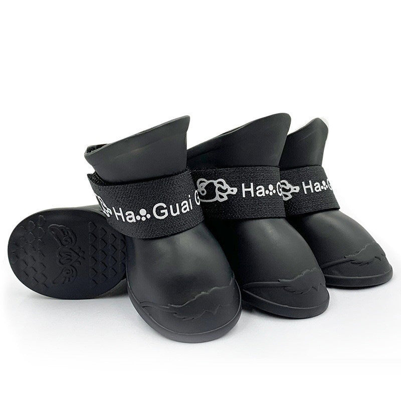 Waterproof silicone dog rain boots with non-slip soles in Purple, side view