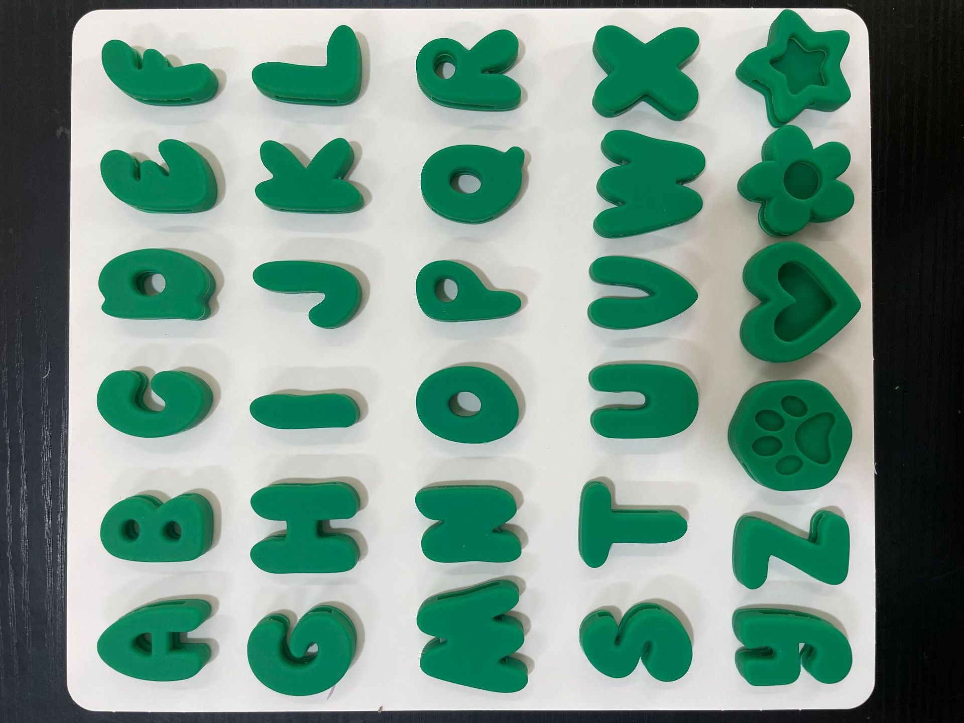 Silicone letter slides for pet collars, available from Pet Royale UK