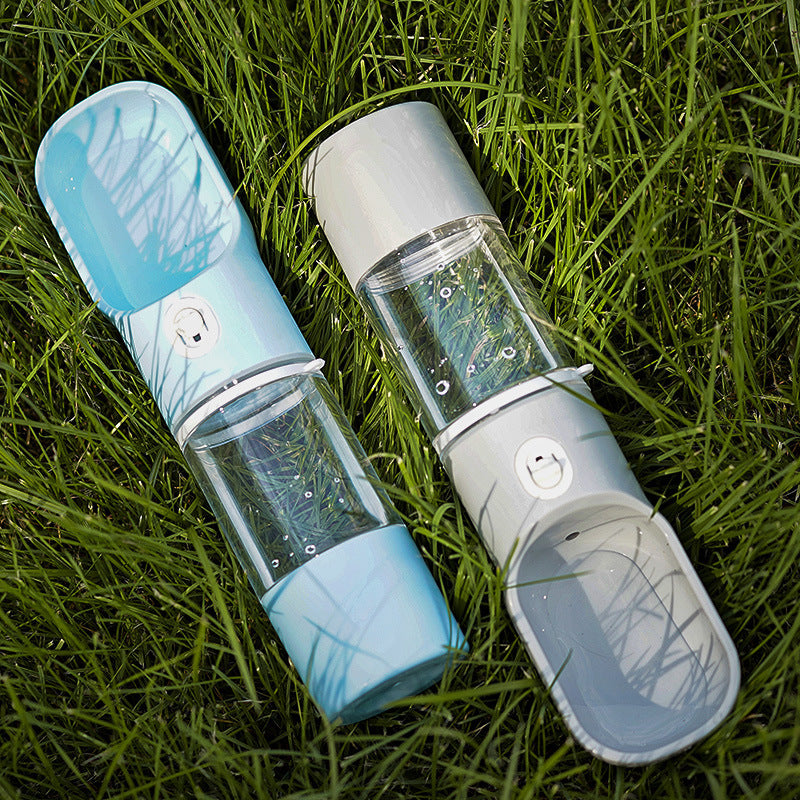 Portable dog water bottle with built-in bowl in grey
