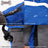 Water-resistant padded dog winter coat with reflective trim in Purple, in a home setting