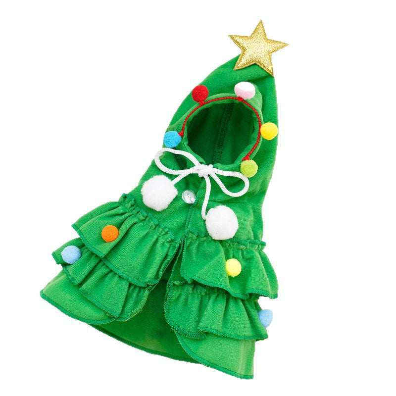 Cat wearing a red Christmas tree pattern cloak