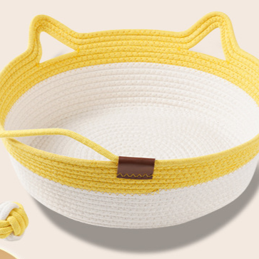 Rattan woven cat nest with ball toy and cream pad, view 2