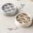 Paw Print and Wave Slow Feeding Pet Bowl with Anti-Slip Base in Light Grey or Milky White