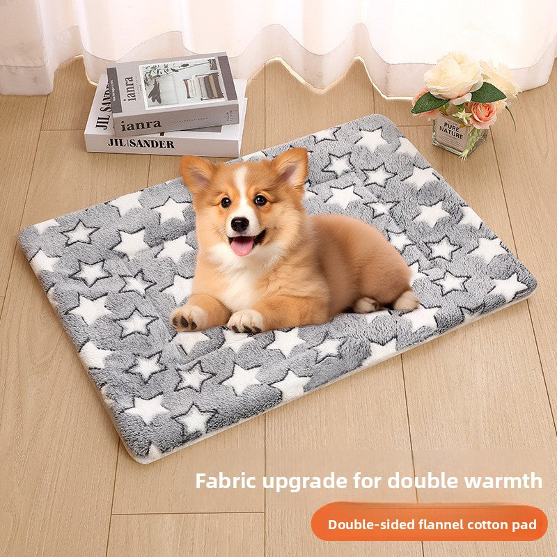 Dog lying on a blue starry sky flannel mat