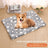 Dog lying on a blue starry sky flannel mat